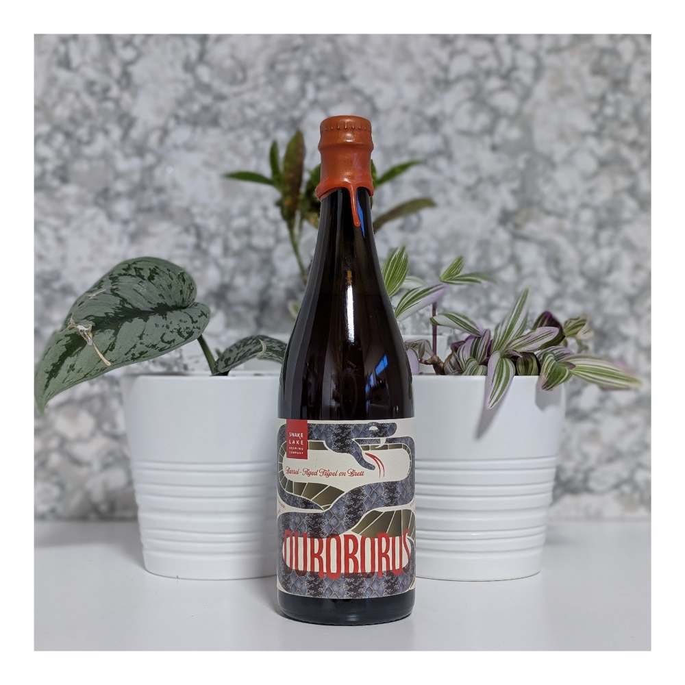 Ouroboros Barrel-Aged Tripel on Brett by Snake Lake Brewing Company, beer label