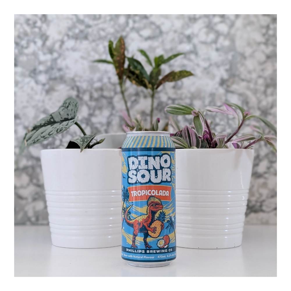 & Malting DinoSour Tropicolada Sour by Phillips Brewing Company, beer label